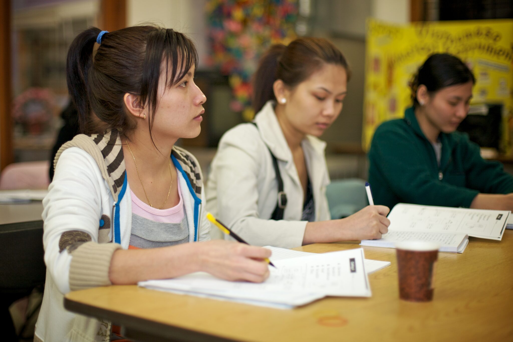 Female Helping Link scholar in class close up